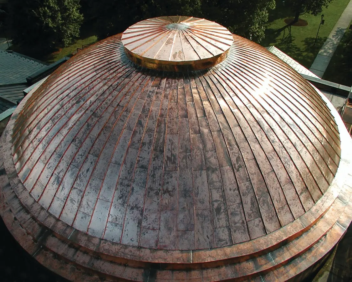 Craftsman Roofing crew installing a new roof in Racing Beach